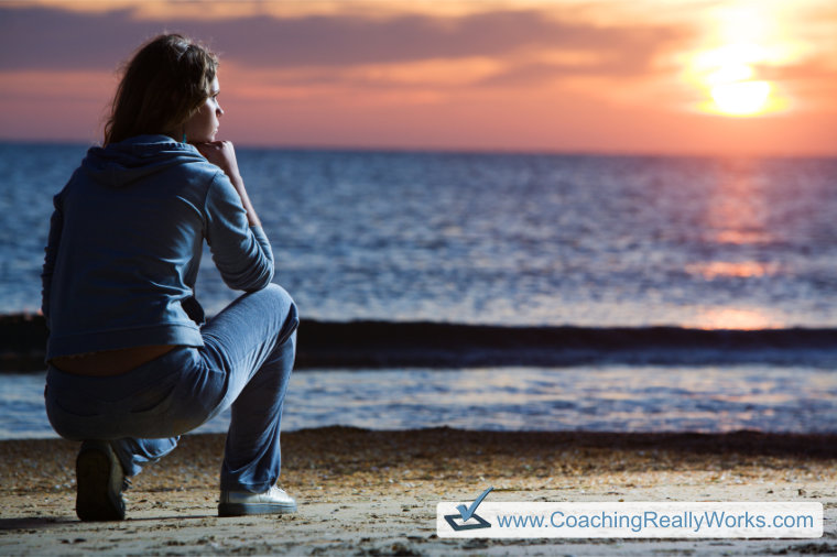 Woman Thinking on the Beach